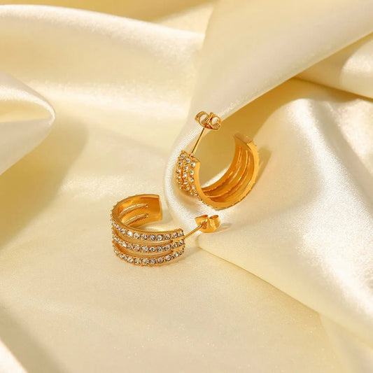 Gold - plated stainless steel spiral drop earrings - AMVIM