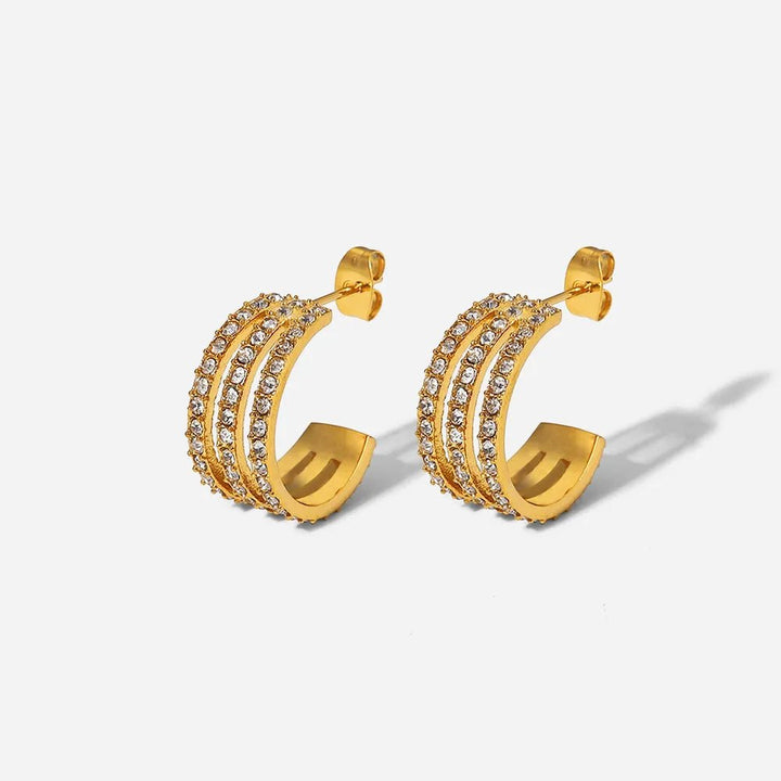 Gold - plated stainless steel spiral drop earrings - AMVIM