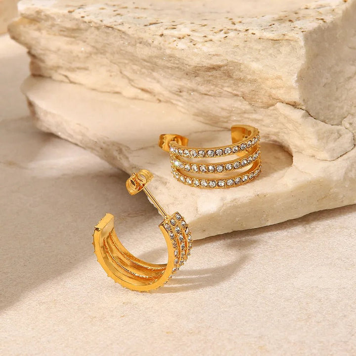 Gold - plated stainless steel spiral drop earrings - AMVIM