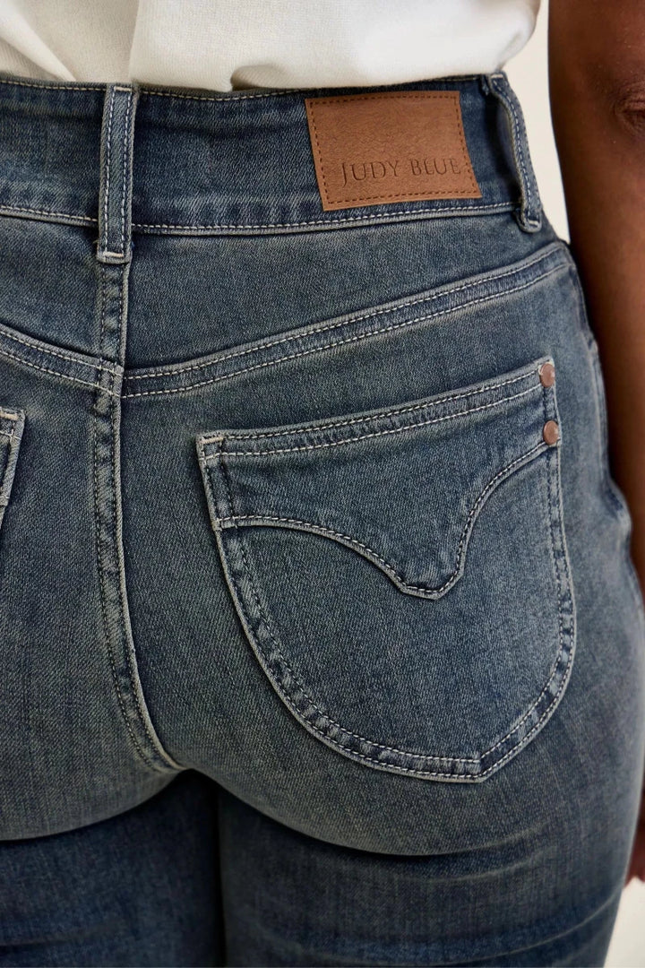 Judy Blue High Waist Double Button Distressed Hem Jeans - AMVIM