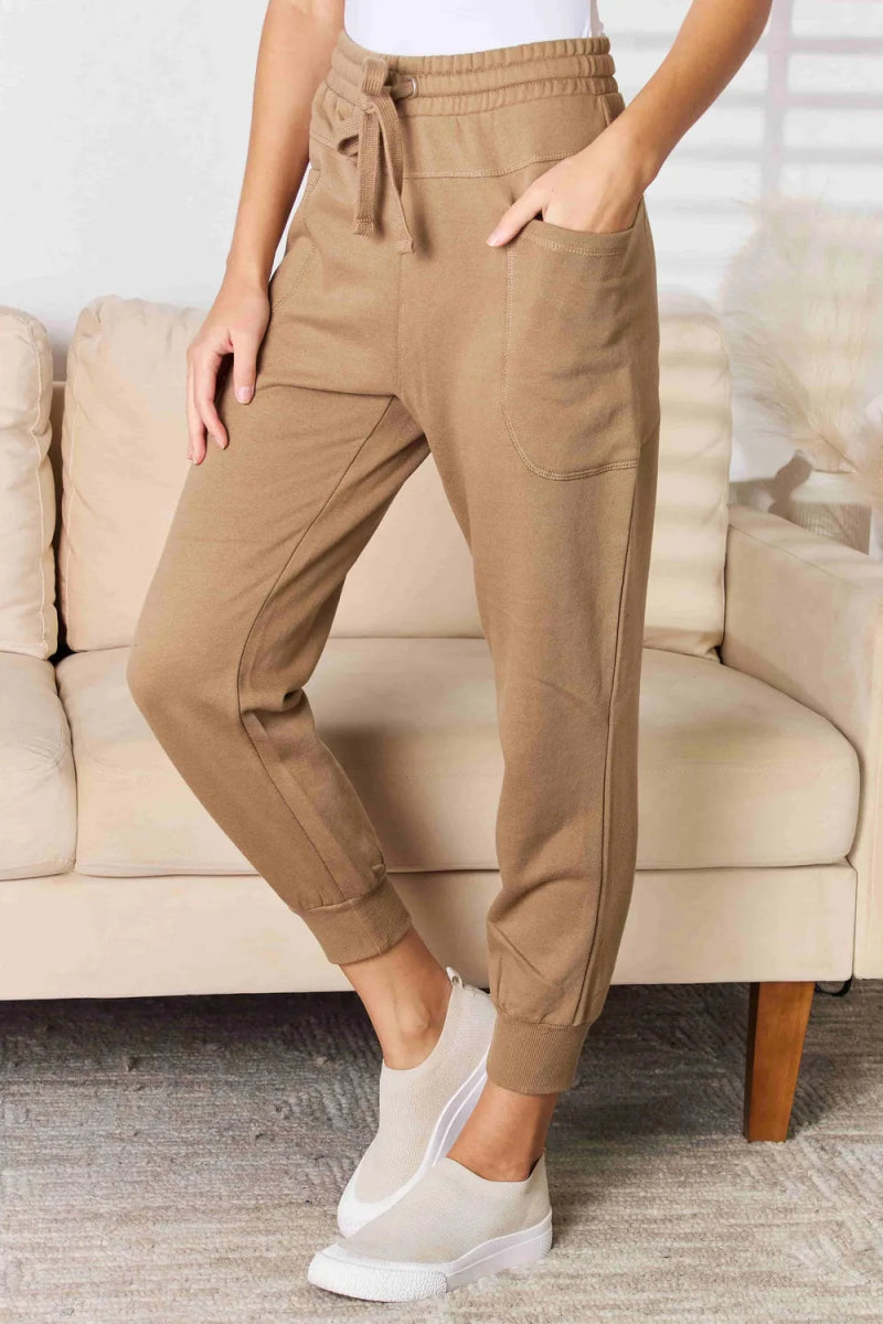 Relaxed high - rise joggers with side pockets - AMVIM