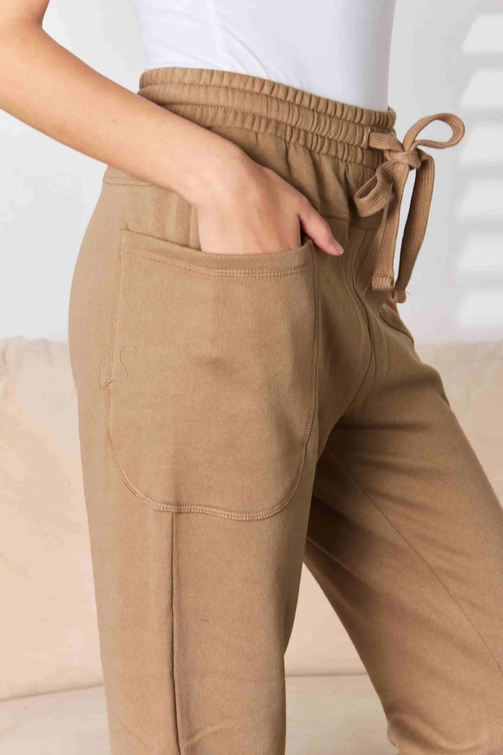 Relaxed high - rise joggers with side pockets - AMVIM