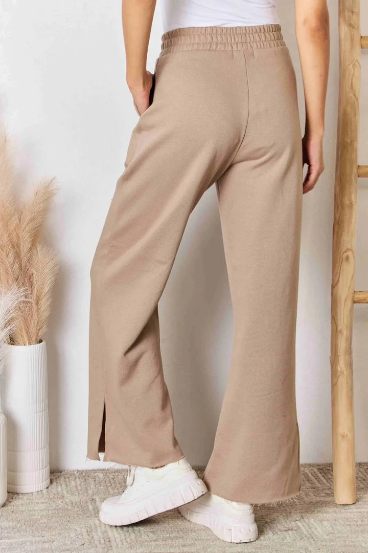 RISEN Wide Waistband Slit Wide Leg Trousers - AMVIM