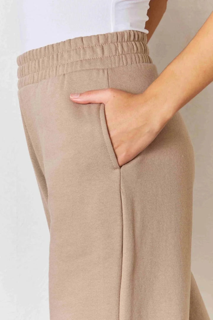 RISEN Wide Waistband Slit Wide Leg Trousers - AMVIM